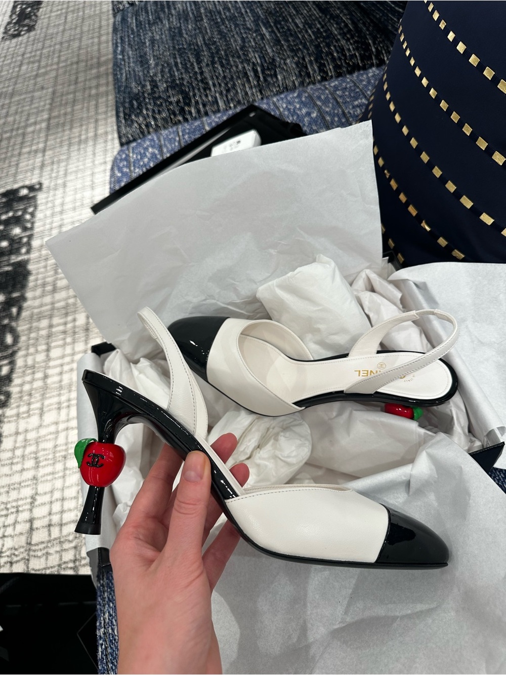 Chanel Lambskin & Patent Calfskin
White & Black Slingbacks Matthieu Blaze Apple